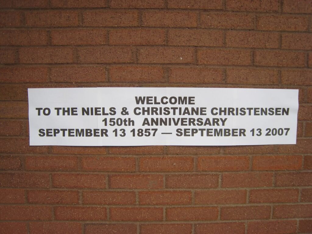 Banner reading: Welcome to the Niels and Christiane Christensen 150th Anniversary, September 13 1857 to September 13 2007
